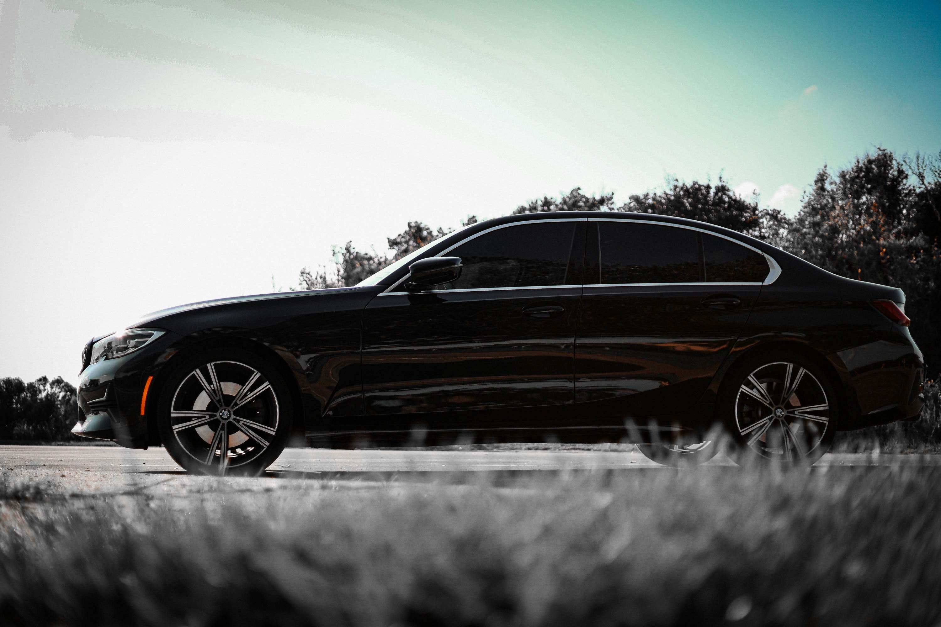 Black BMW with tinted windows
