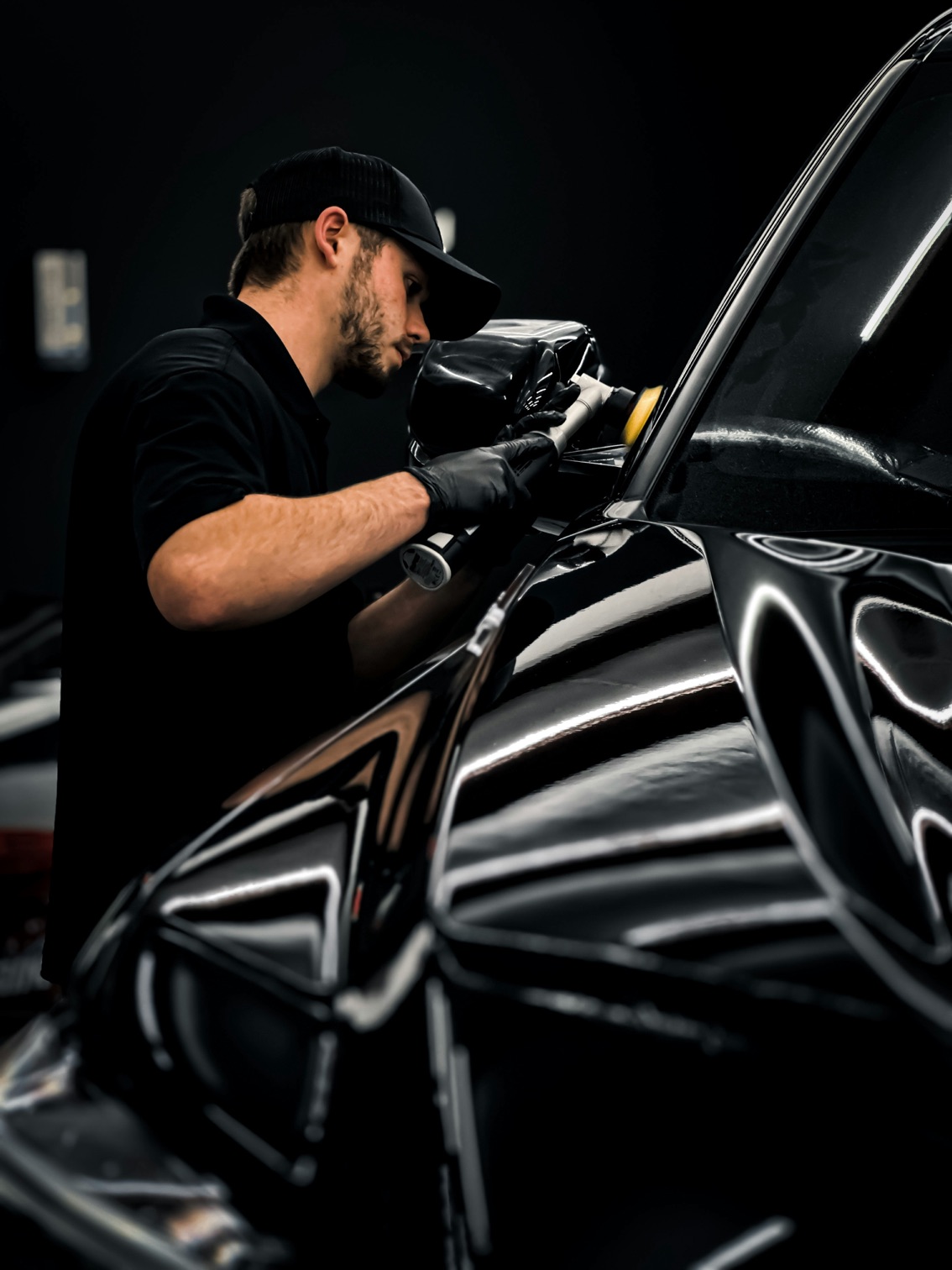 Technician applying tint